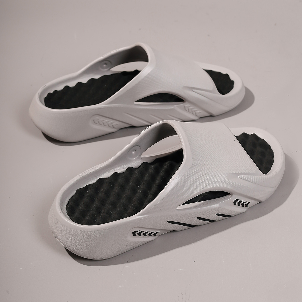 Pantofole unisex imbottite e leggere in EVA a punta aperta detail 2